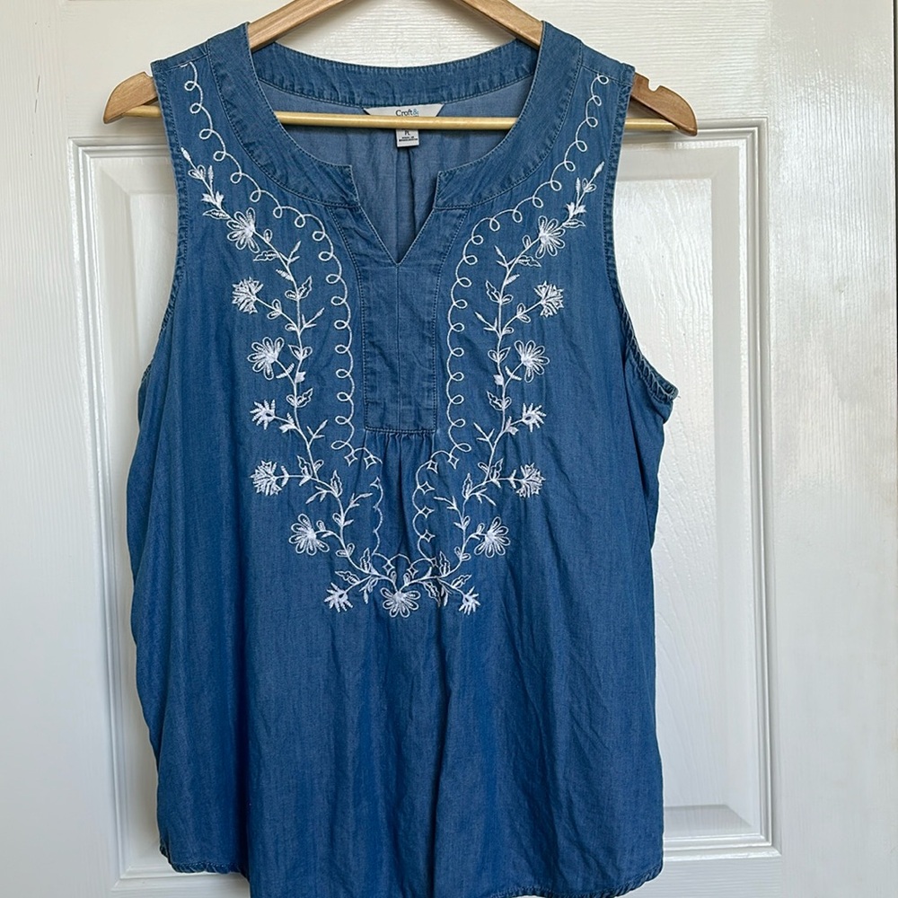 Women size PL. light denim tank top with white embroidery.  Great condition.
